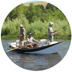 Custom guided fly fishing clients in guide's boat